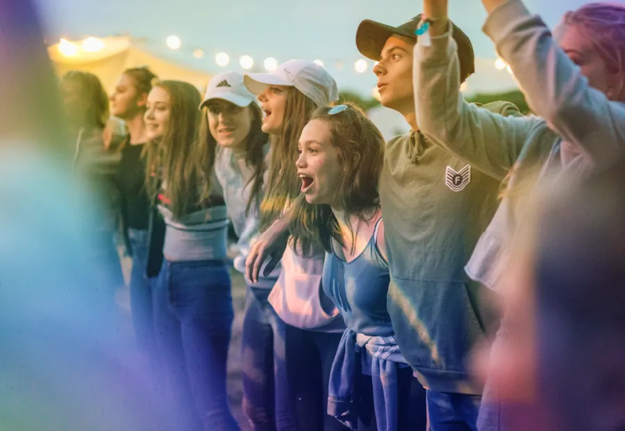 group of young people celebrating 